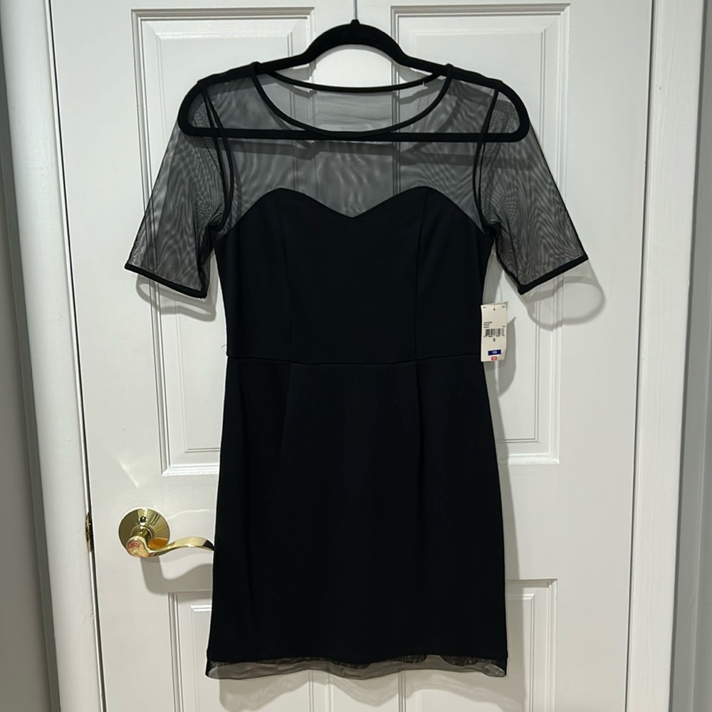 Brand new women’s black dress-size small